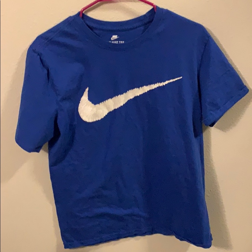 Blue men’s nike shirt.